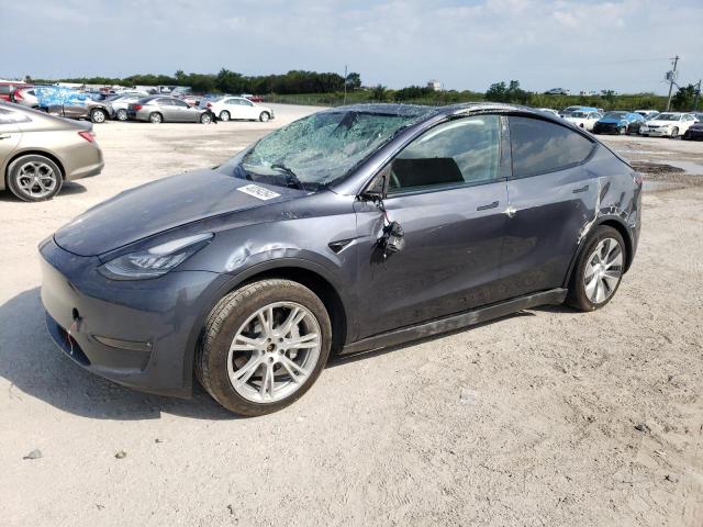 TESLA MODEL Y 2023 with VIN 7SAYGDEE0PA059894 - Photo from auction