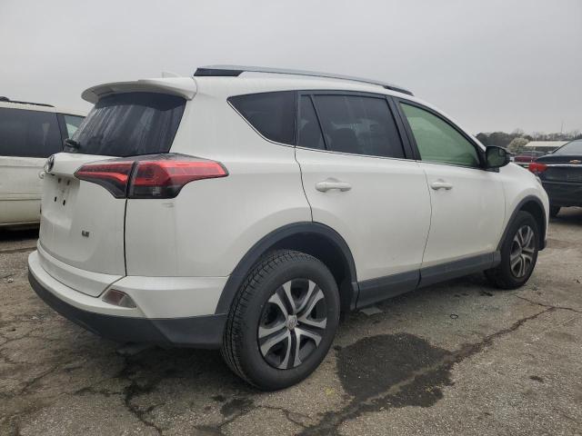 Photo 3 from auction – 2017 TOYOTA RAV4 LE with VIN JTMZFREV8HJ705066
