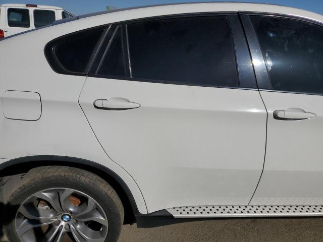 Photo 10 from auction – 2012 BMW X6 XDRIVE5 with VIN 5UXFG8C56CL590203