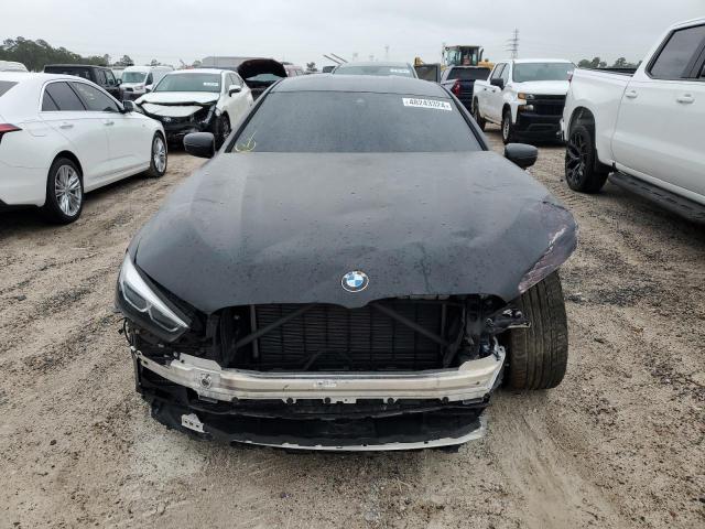 Photo 5 from auction – 2022 BMW M850XI with VIN WBAGV8C02NCJ61348