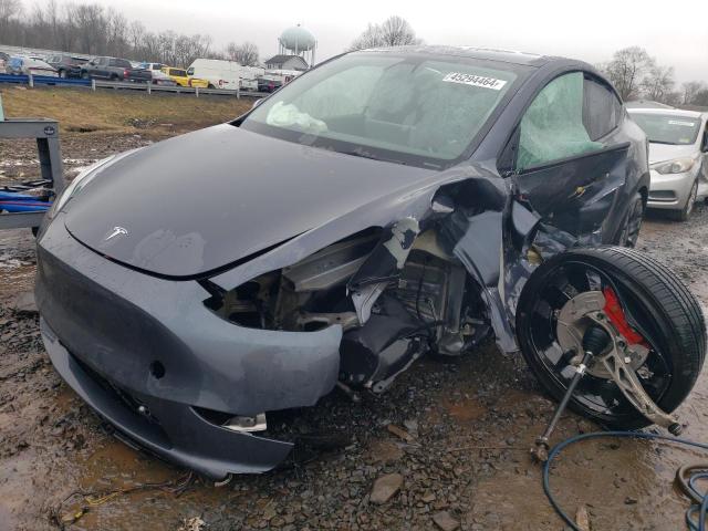 TESLA MODEL Y 2022 with VIN 7SAYGDEFXNF369186 - Photo from auction