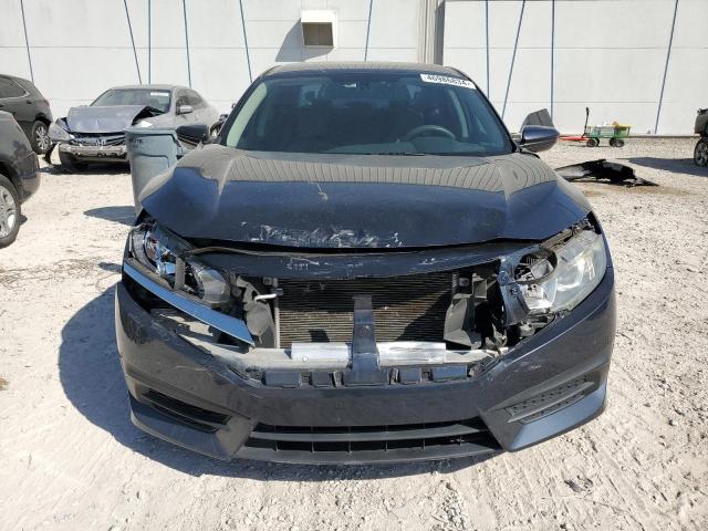 Photo 5 from auction – 2018 HONDA CIVIC LX with VIN 19XFC2F55JE031902