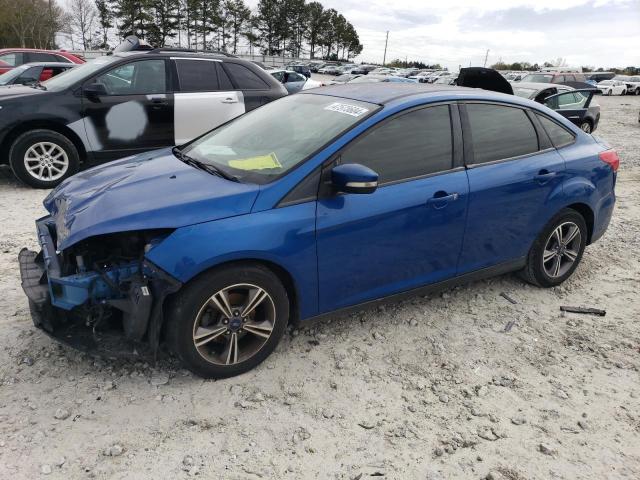 FORD FOCUS SE 2018 with VIN 1FADP3F25JL201034 - Photo from auction