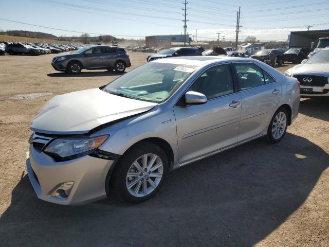 TOYOTA CAMRY HYBR 2012 with VIN 4T1BD1FK2CU038835 - Photo from auction