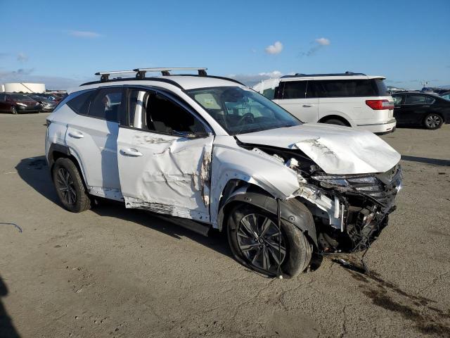 Photo 4 from auction – 2022 HYUNDAI TUCSON BLU with VIN KM8JBCA17NU024363