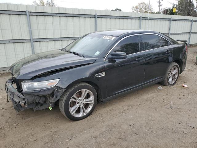 FORD TAURUS SEL 2014 with VIN 1FAHP2E8XEG137427 - Photo from auction