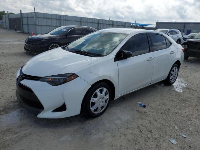 TOYOTA COROLLA L 2018 with VIN 5YFBURHE8JP795758 - Photo from auction