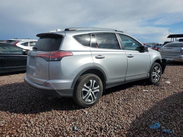Photo 3 from auction – 2018 TOYOTA RAV4 LE with VIN 2T3ZFREV2JW459722