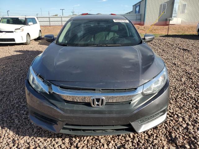 Photo 5 from auction – 2018 HONDA CIVIC LX with VIN 2HGFC2F58JH560203