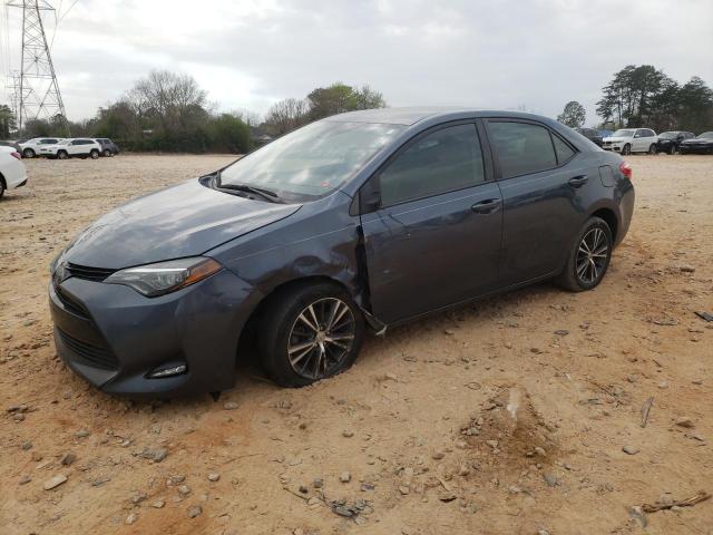 TOYOTA COROLLA L 2018 with VIN 2T1BURHE3JC047323 - Photo from auction