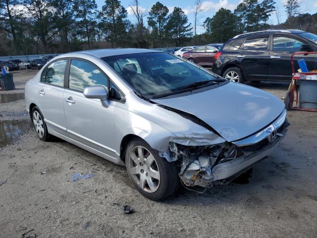 Photo 4 from auction – 2011 HONDA CIVIC LX with VIN 19XFA1F5XBE049085