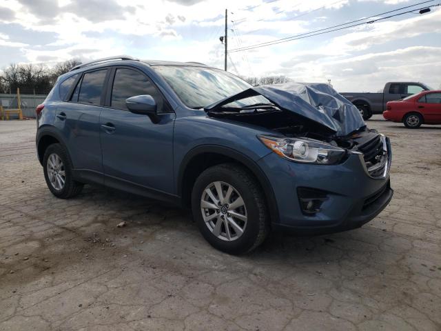 Photo 4 from auction – 2016 MAZDA CX-5 TOURI with VIN JM3KE2CY9G0877644