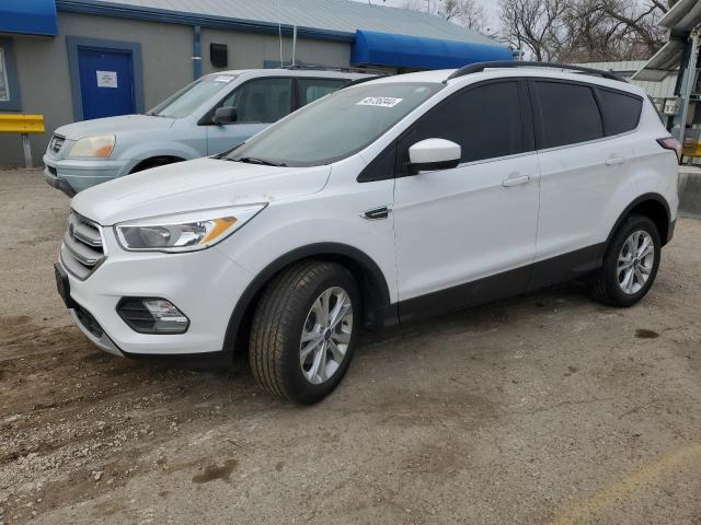 FORD ESCAPE SE 2018 with VIN 1FMCU9GD0JUC37382 - Photo from auction