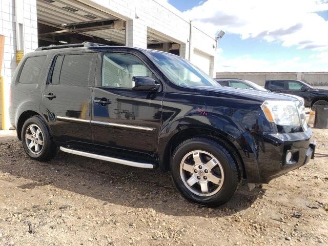 Photo 4 from auction – 2011 HONDA PILOT TOUR with VIN 5FNYF4H93BB507328