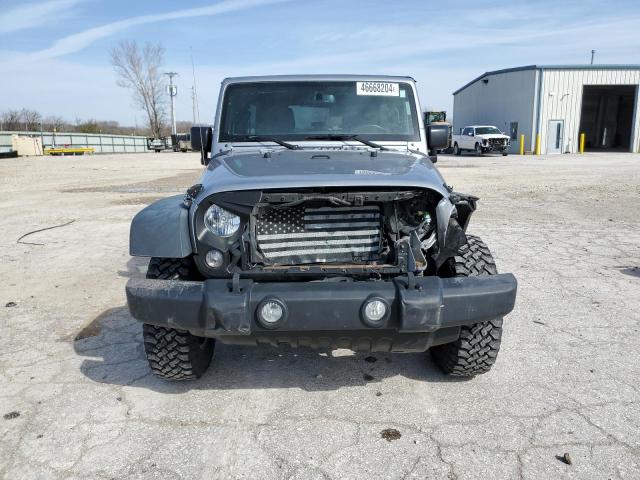 Photo 5 from auction – 2016 JEEP WRANGLER U with VIN 1C4BJWDGXGL113057