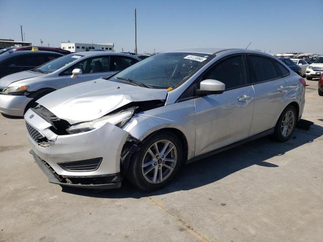 FORD FOCUS SE 2018 with VIN 1FADP3FE1JL318989 - Photo from auction