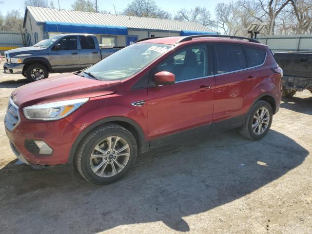 FORD ESCAPE SE 2018 with VIN 1FMCU0GD2JUB25033 - Photo from auction