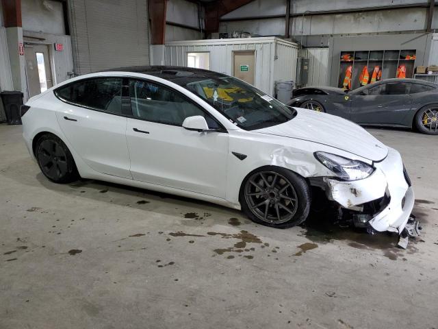 Photo 4 from auction – 2022 TESLA MODEL 3 with VIN 5YJ3E1EA2NF370753