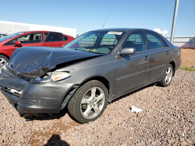 TOYOTA CAMRY LE 2004 with VIN 4T1BF32K04U582408 - Photo from auction