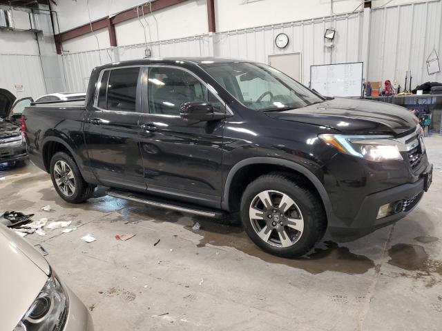 Photo 4 from auction – 2017 HONDA RIDGELINE with VIN 5FPYK3F62HB024797