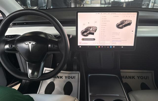 Photo 9 from auction – 2023 TESLA MODEL Y with VIN 7SAYGDEEXPF626051