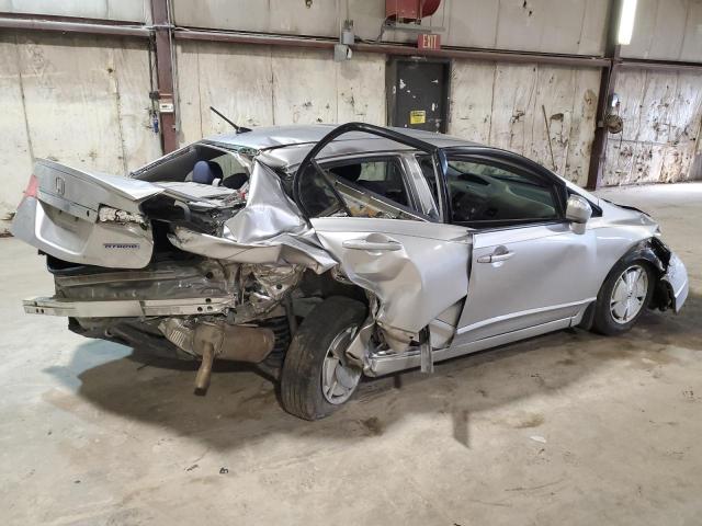 Photo 3 from auction – 2009 HONDA CIVIC HYBR with VIN JHMFA36239S013911