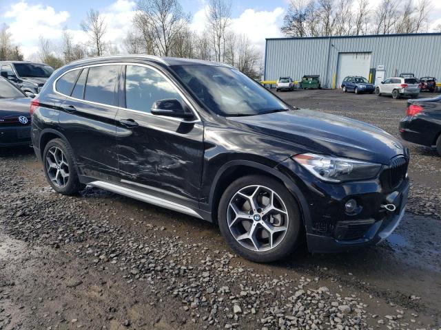 Photo 4 from auction – 2018 BMW X1 XDRIVE2 with VIN WBXHT3C32J3H33254