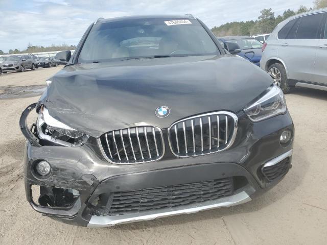 Photo 5 from auction – 2017 BMW X1 XDRIVE2 with VIN WBXHT3C3XH5F83358