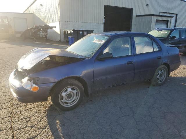 TOYOTA COROLLA VE 2000 with VIN 1NXBR12E1YZ309280 - Photo from auction