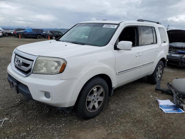 HONDA PILOT TOUR 2011 with VIN 5FNYF4H92BB022128 - Photo from auction