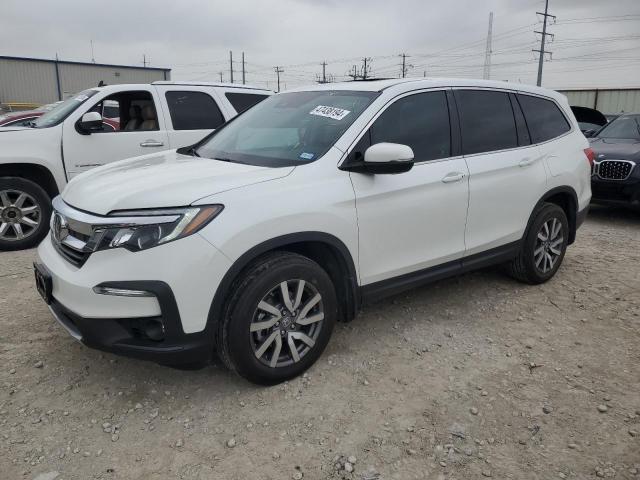 HONDA PILOT EXL 2022 with VIN 5FNYF6H53NB017159 - Photo from auction