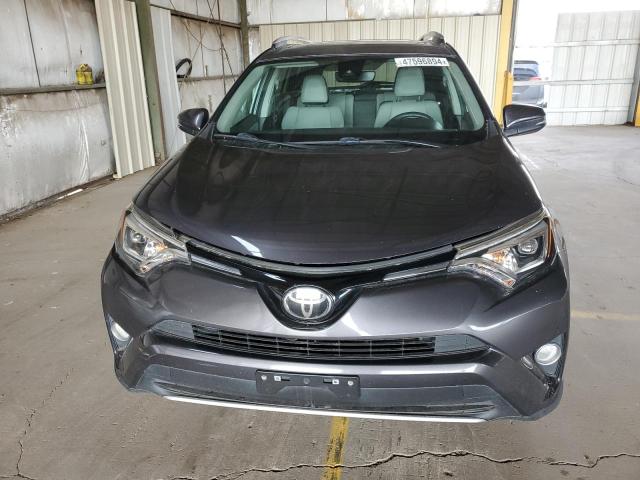 Photo 5 from auction – 2018 TOYOTA RAV4 LIMIT with VIN 2T3DFREV0JW745143