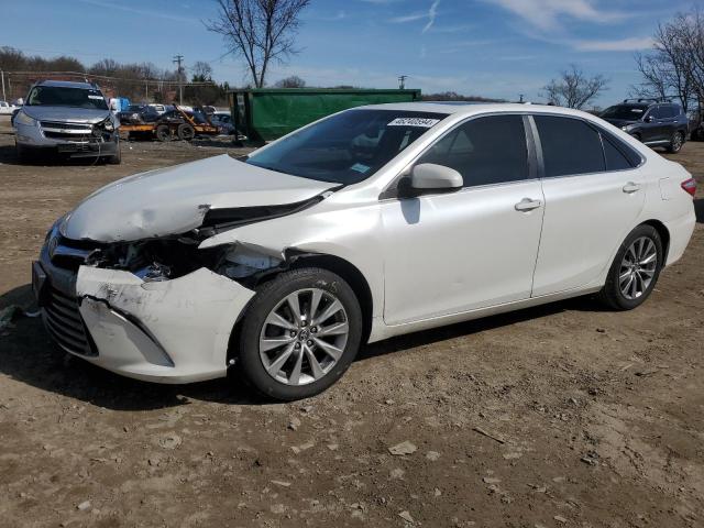 TOYOTA CAMRY LE 2017 with VIN 4T1BF1FK8HU619824 - Photo from auction