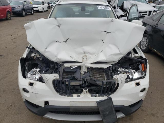 Photo 11 from auction – 2013 BMW X1 XDRIVE2 with VIN WBAVL1C51DVR91998