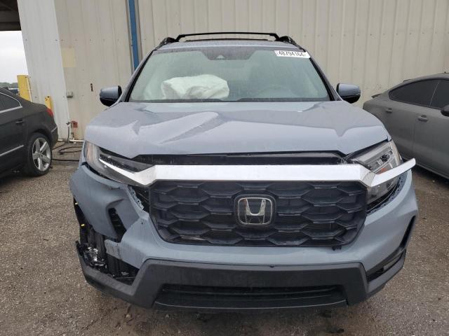 Photo 5 from auction – 2022 HONDA PASSPORT E with VIN 5FNYF7H5XNB000235