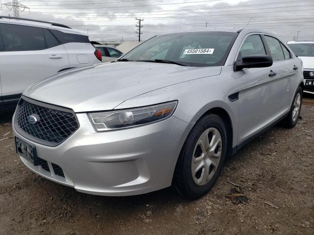 FORD TAURUS POL 2014 with VIN 1FAHP2L8XEG178661 - Photo from auction