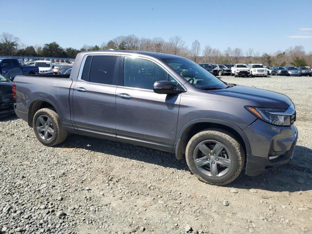 Photo 4 from auction – 2022 HONDA RIDGELINE with VIN 5FPYK3F79NB013980