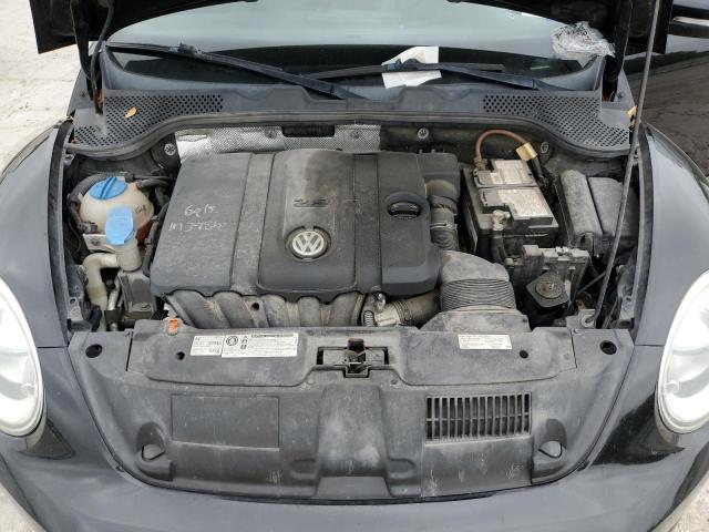 Photo 11 from auction – 2013 VOLKSWAGEN BEETLE with VIN 3VWJX7AT2DM605624