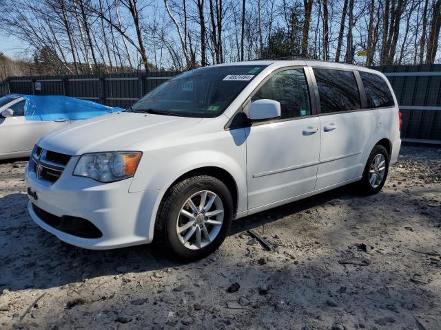 DODGE GRAND CARA 2014 مع رقم تعريف المركبة 2C4RDGCG0ER128071 - صورة من المزاد