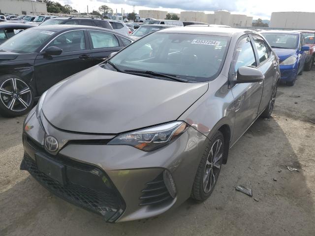 TOYOTA COROLLA L 2017 with VIN 5YFBURHE9HP665191 - Photo from auction