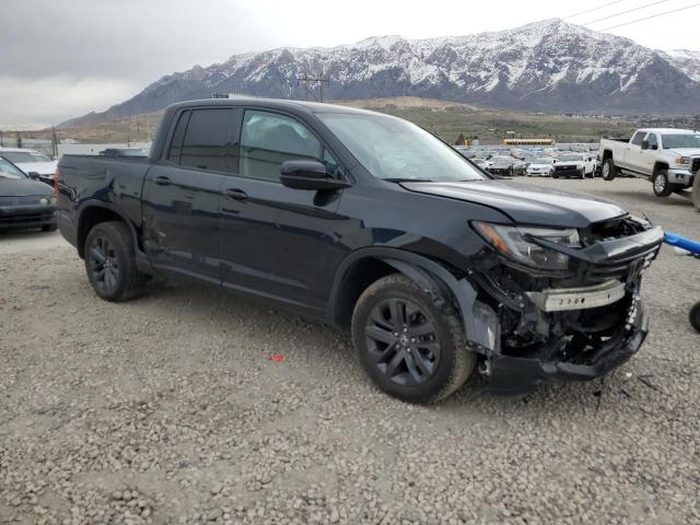 Photo 4 from auction – 2022 HONDA RIDGELINE with VIN 5FPYK3F12NB016599