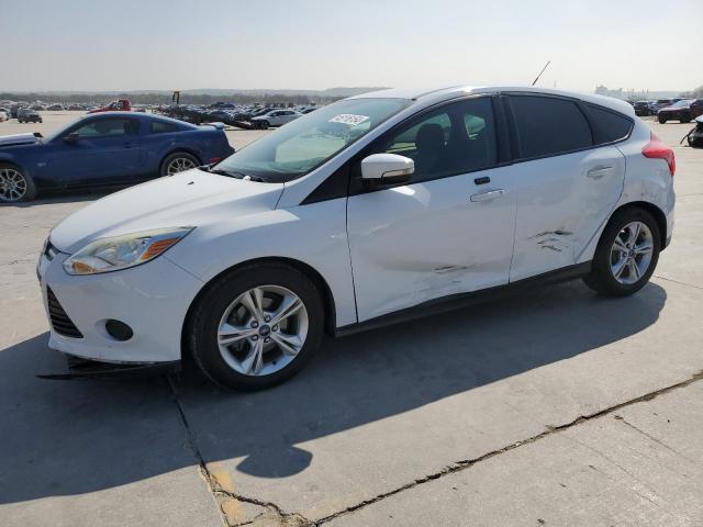 FORD FOCUS SE 2014 with VIN 1FADP3K21EL124576 - Photo from auction