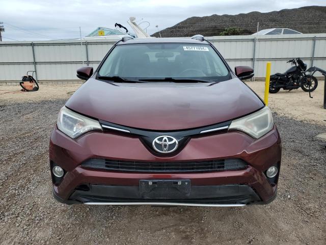 Photo 5 from auction – 2016 TOYOTA RAV4 XLE with VIN JTMWFREV3GD091561