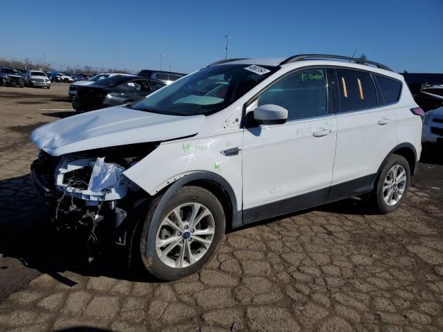 FORD ESCAPE SE 2018 with VIN 1FMCU9GD7JUB82610 - Photo from auction