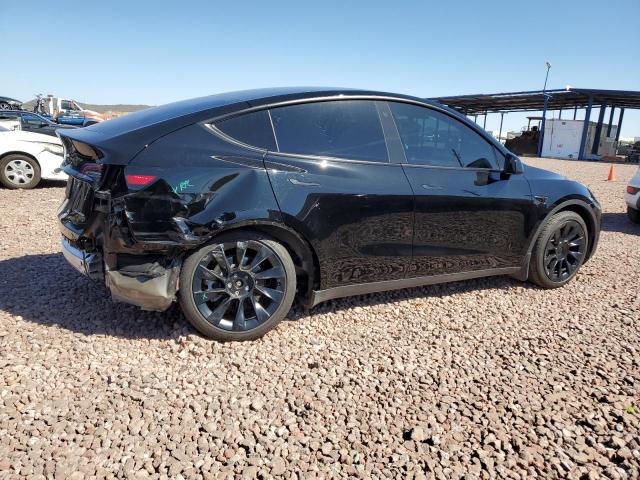 Photo 3 from auction – 2023 TESLA MODEL Y with VIN 7SAYGAEE2PF749860