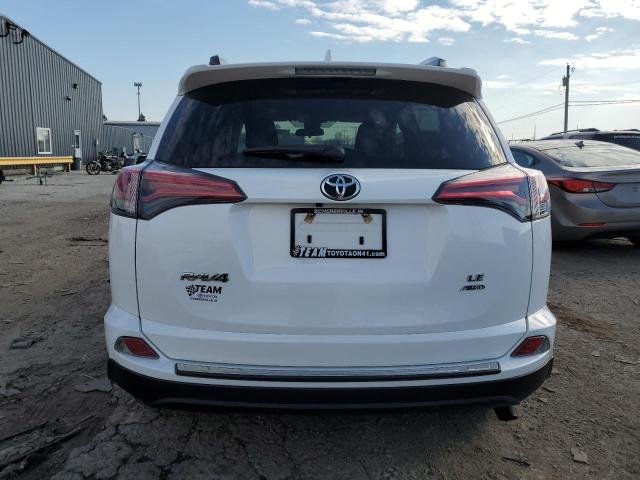 Photo 6 from auction – 2018 TOYOTA RAV4 LE with VIN 2T3BFREV2JW805754