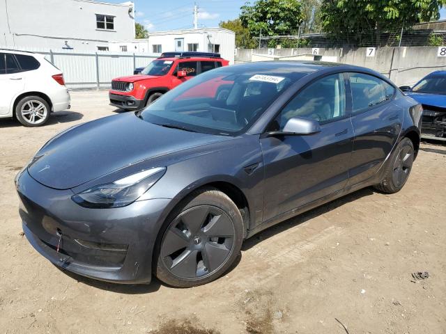TESLA MODEL 3 2023 with VIN 5YJ3E1EA6PF695876 - Photo from auction