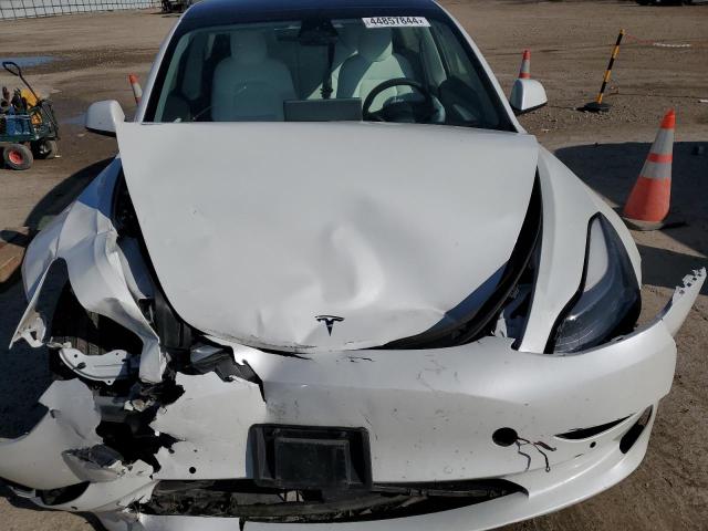 Photo 11 from auction – 2021 TESLA MODEL 3 with VIN 5YJ3E1EB7MF046835