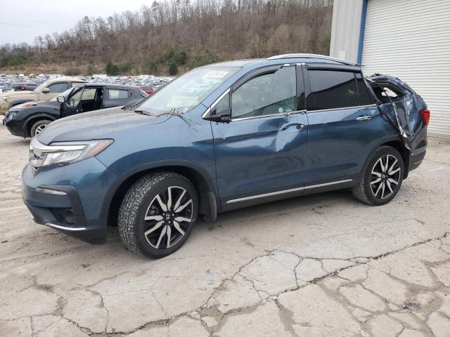 HONDA PILOT TOUR 2021 with VIN 5FNYF6H64MB084117 - Photo from auction
