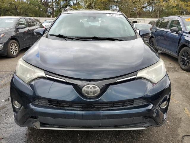 Photo 5 from auction – 2017 TOYOTA RAV4 XLE with VIN JTMWFREV4HD096723